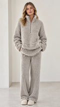 Full front view of model wearing light gray sherpa fleece quarter-zip loungewear set