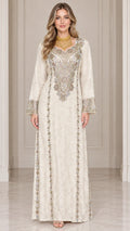 Front full-length view of woman wearing ivory embroidered long sleeve maxi kaftan dress