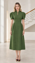 Front view of model wearing olive green mandarin collar puff sleeve A-line midi dress