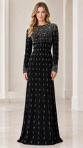 Front view of woman wearing Black long-sleeve beaded maxi evening gown