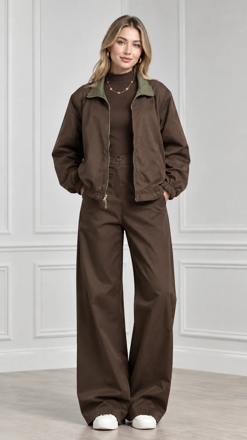 Front view of model wearing brown contrast collar zip jacket and matching wide leg pants