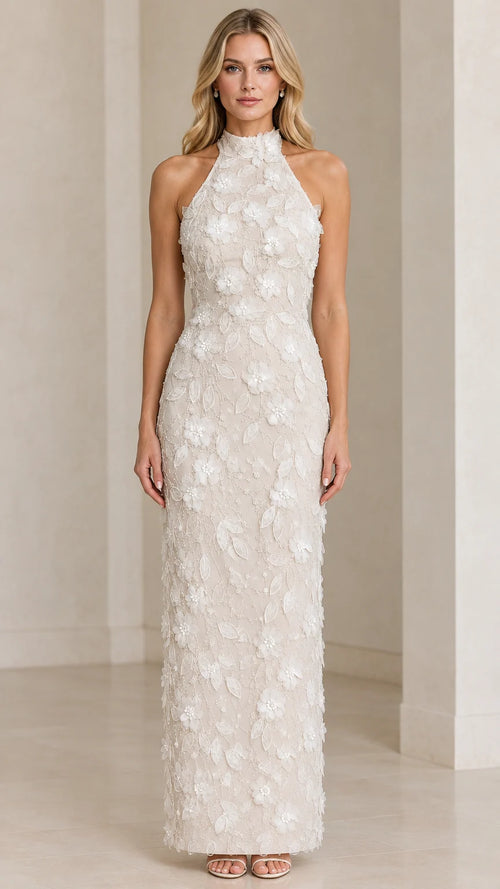 Front view of model wearing Ivory 3D floral applique halter maxi evening dress