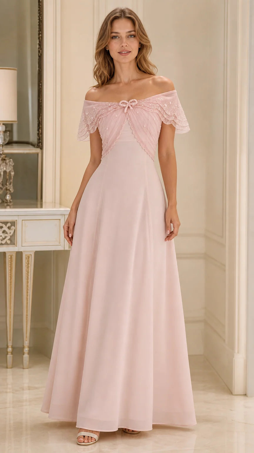 Front view of model wearing blush pink off-the-shoulder beaded evening maxi dress
