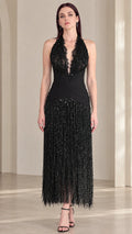 Front view of black halter neck sequin fringe evening dress on model