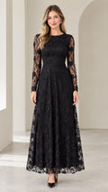 Front view of woman wearing long sleeve black floral lace maxi evening dress