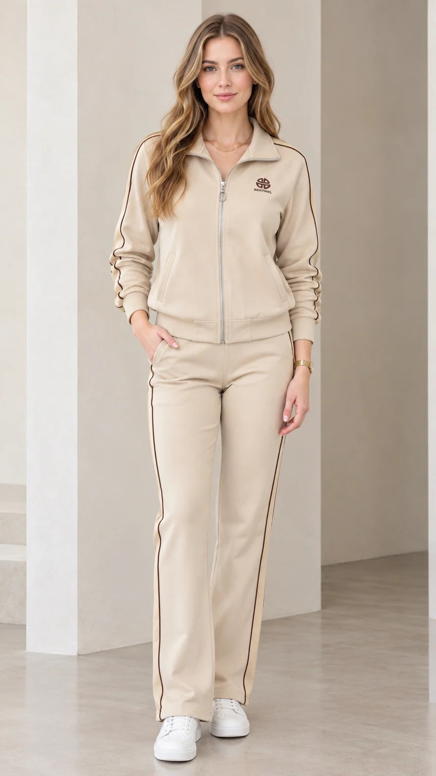 Women's beige two-piece track set with zip jacket and straight leg pants front view