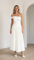 Model wearing white off-shoulder asymmetric pleated midi dress from front