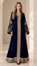 Front view of woman wearing navy blue velvet embroidered kaftan maxi dress