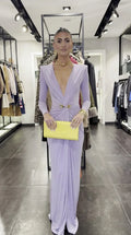 Front view of lavender long-sleeve maxi dress with gold belt accent