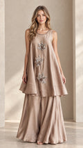 Front view of champagne sleeveless beaded tunic and palazzo pant set