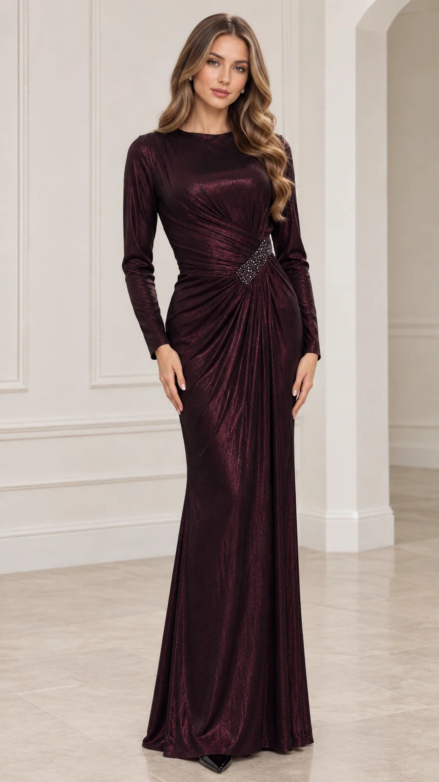 Front view of model wearing Burgundy long sleeve metallic shimmer maxi evening gown with ruched waist