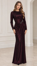 Front view of model wearing Burgundy long sleeve metallic shimmer maxi evening gown with ruched waist