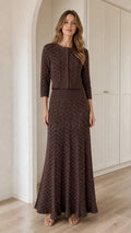 Front view of model wearing Chocolate Brown pointelle knit cardigan and maxi skirt set