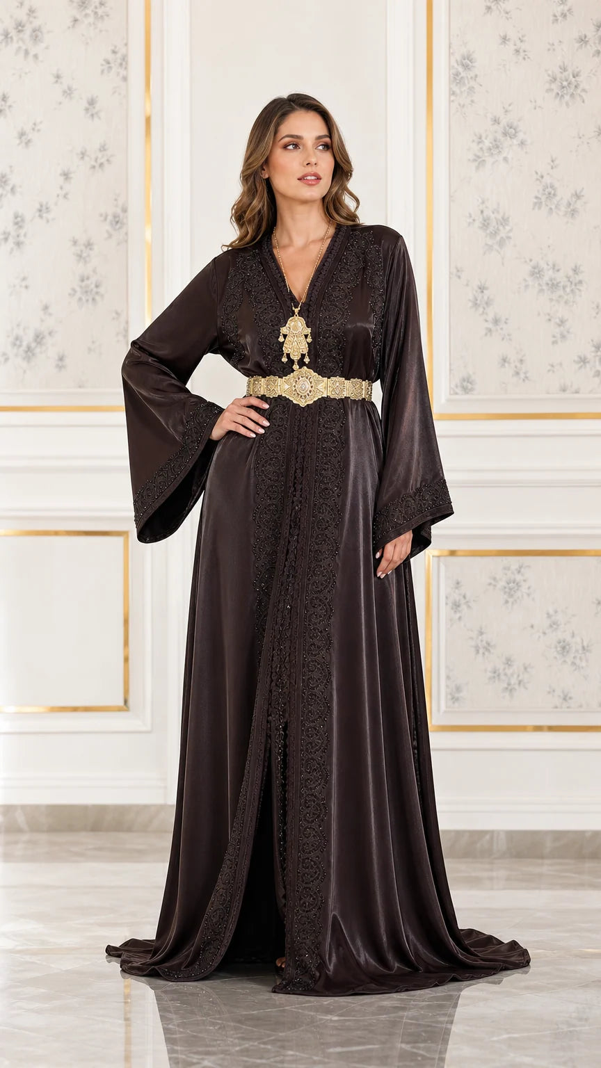 Full front view of dark brown satin caftan maxi dress with gold belt and embroidery