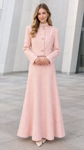 Front full-length view of model wearing Blush Pink embellished tweed cropped jacket and matching A-line maxi skirt set