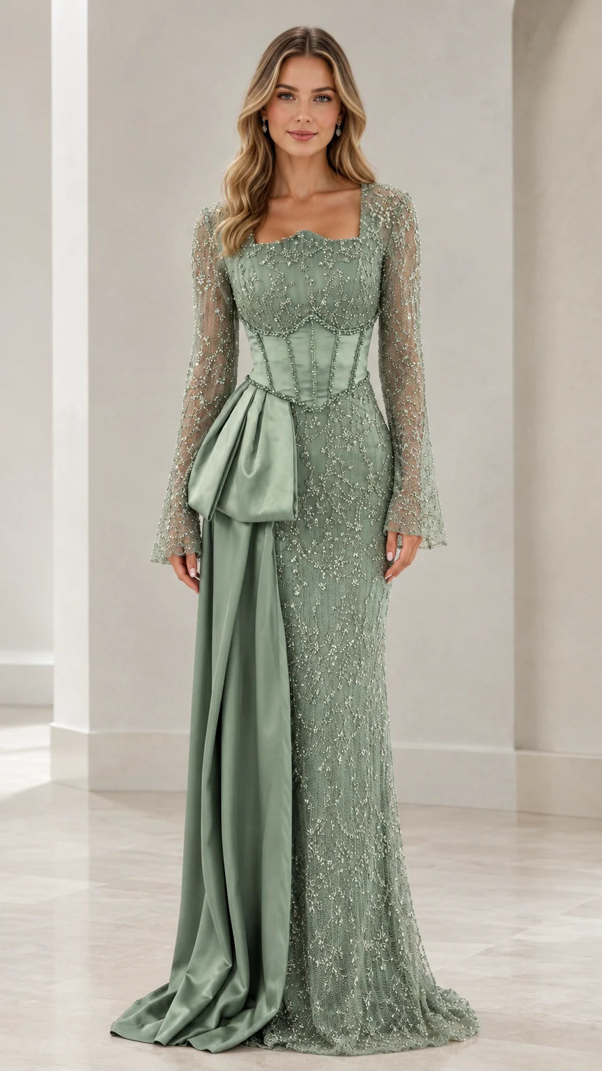 Front view of model wearing sage green beaded evening gown with corset bodice and satin side drape