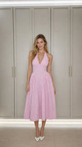 Front view of model wearing pink gingham halter midi dress