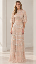 Front view of woman wearing full-length sequined flutter sleeve evening gown in champagne