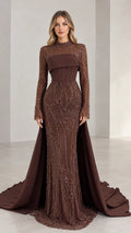 Front view of woman wearing brown beaded high neck evening gown with corset bodice and train