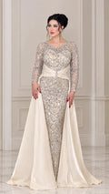 Front view of woman wearing a champagne sequin long sleeve evening gown with satin overskirt