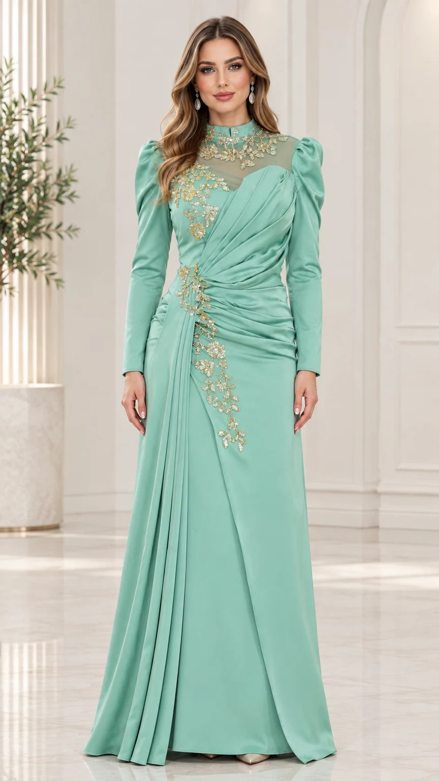 Mint green long sleeve evening gown with gold embroidery and pleated waist front view