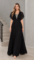Front view of model wearing black flutter sleeve chiffon evening maxi dress with rhinestone illusion neckline