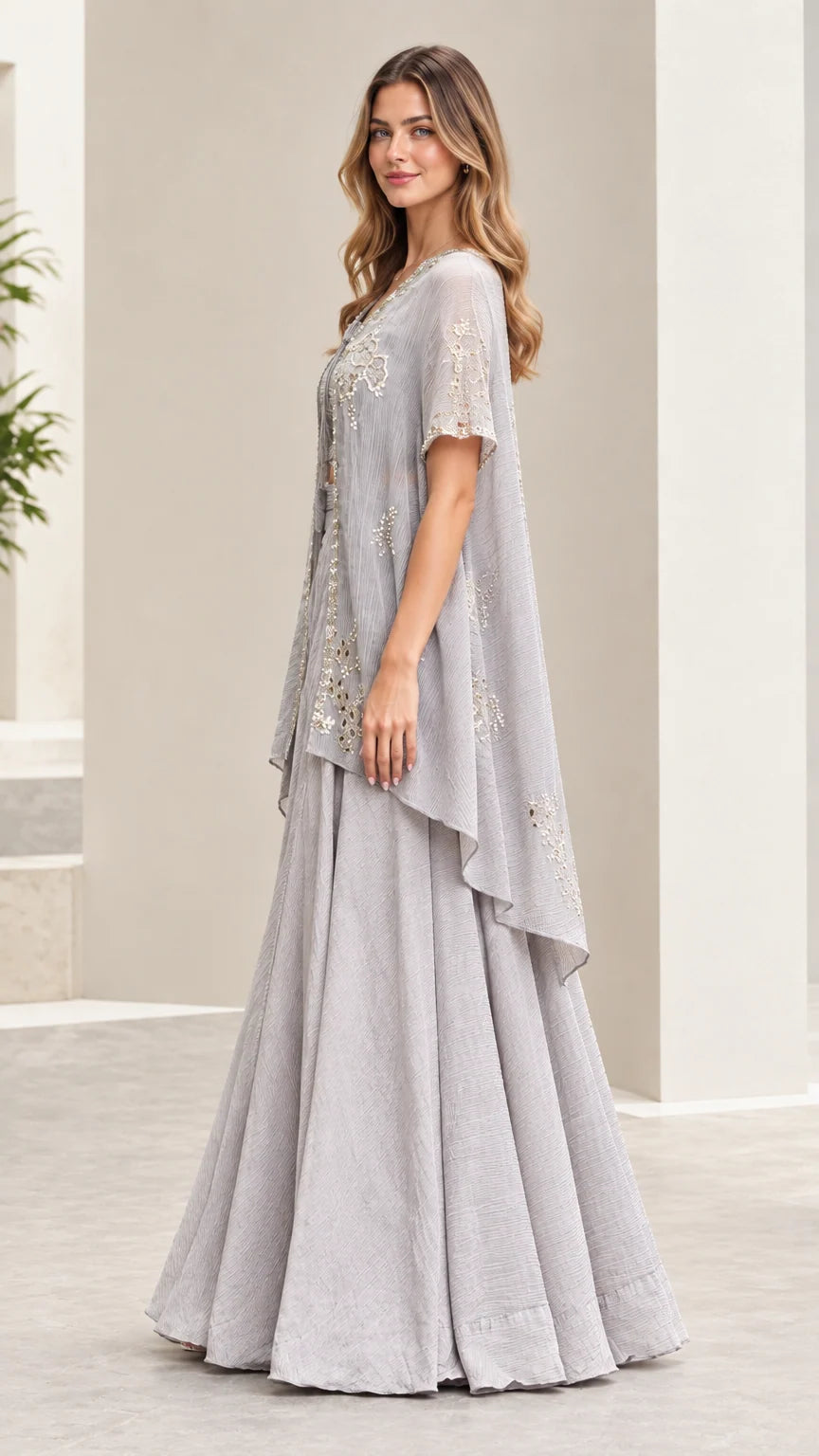 Side angle view of silver gray embroidered cape and palazzo pants set
