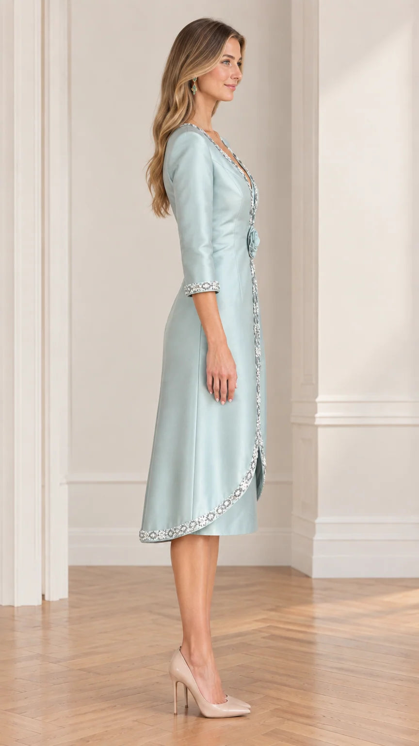 Side profile view of elegant ice blue formal midi dress with 3/4 sleeves