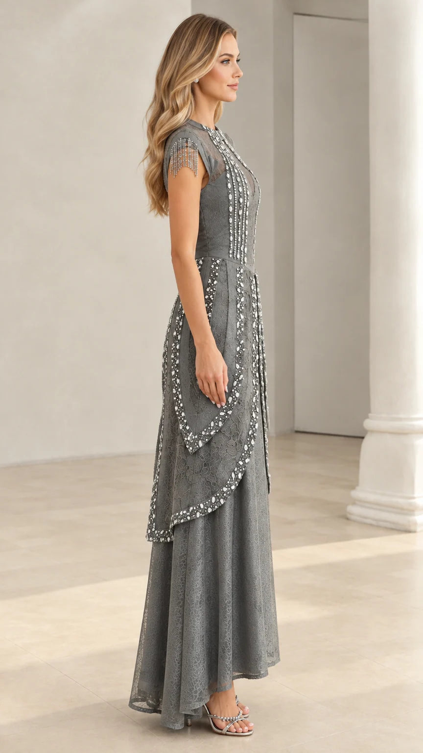 Side view of slate grey floor-length formal lace gown