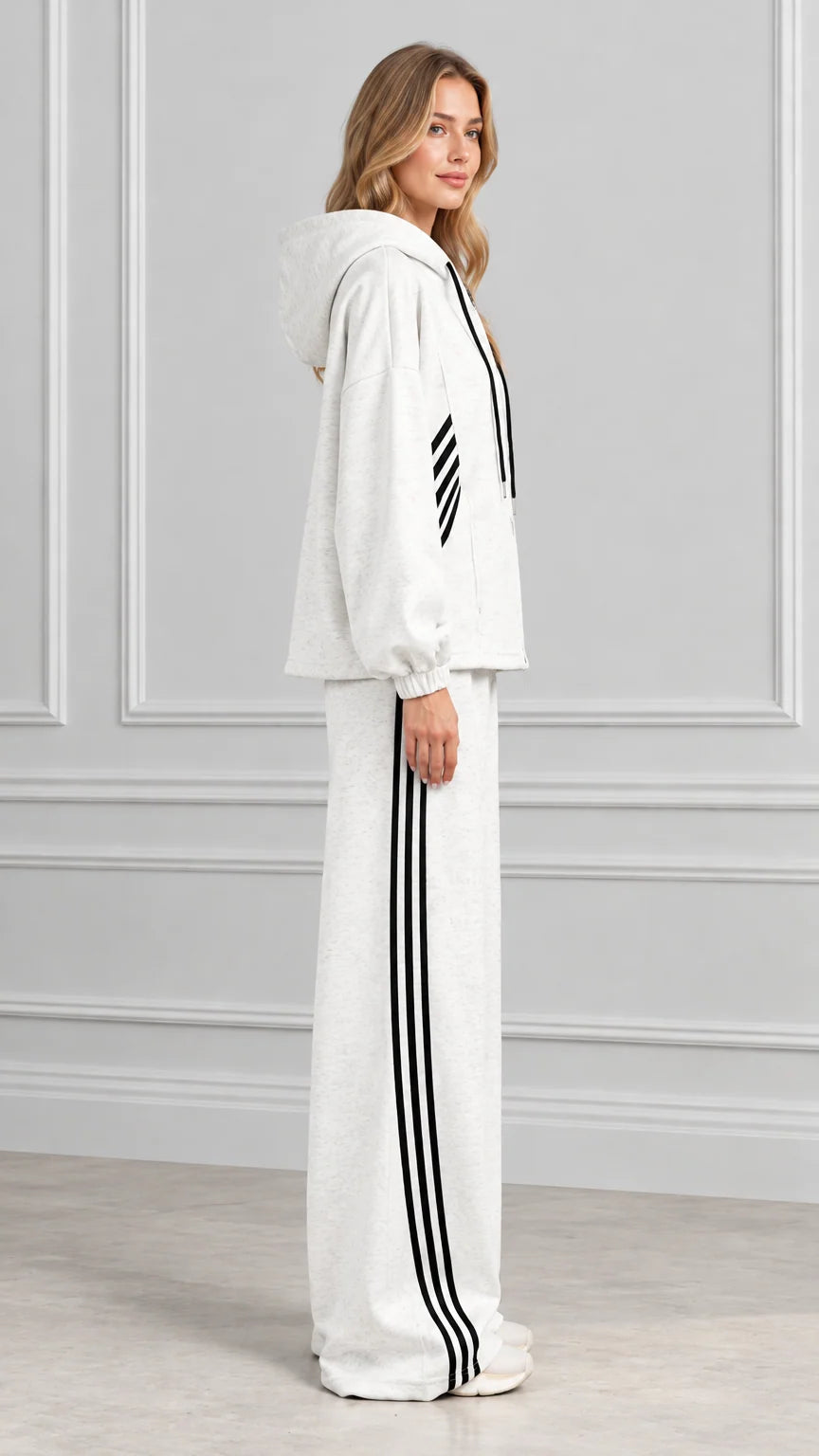 Side view of woman wearing Heather Gray matching tracksuit set