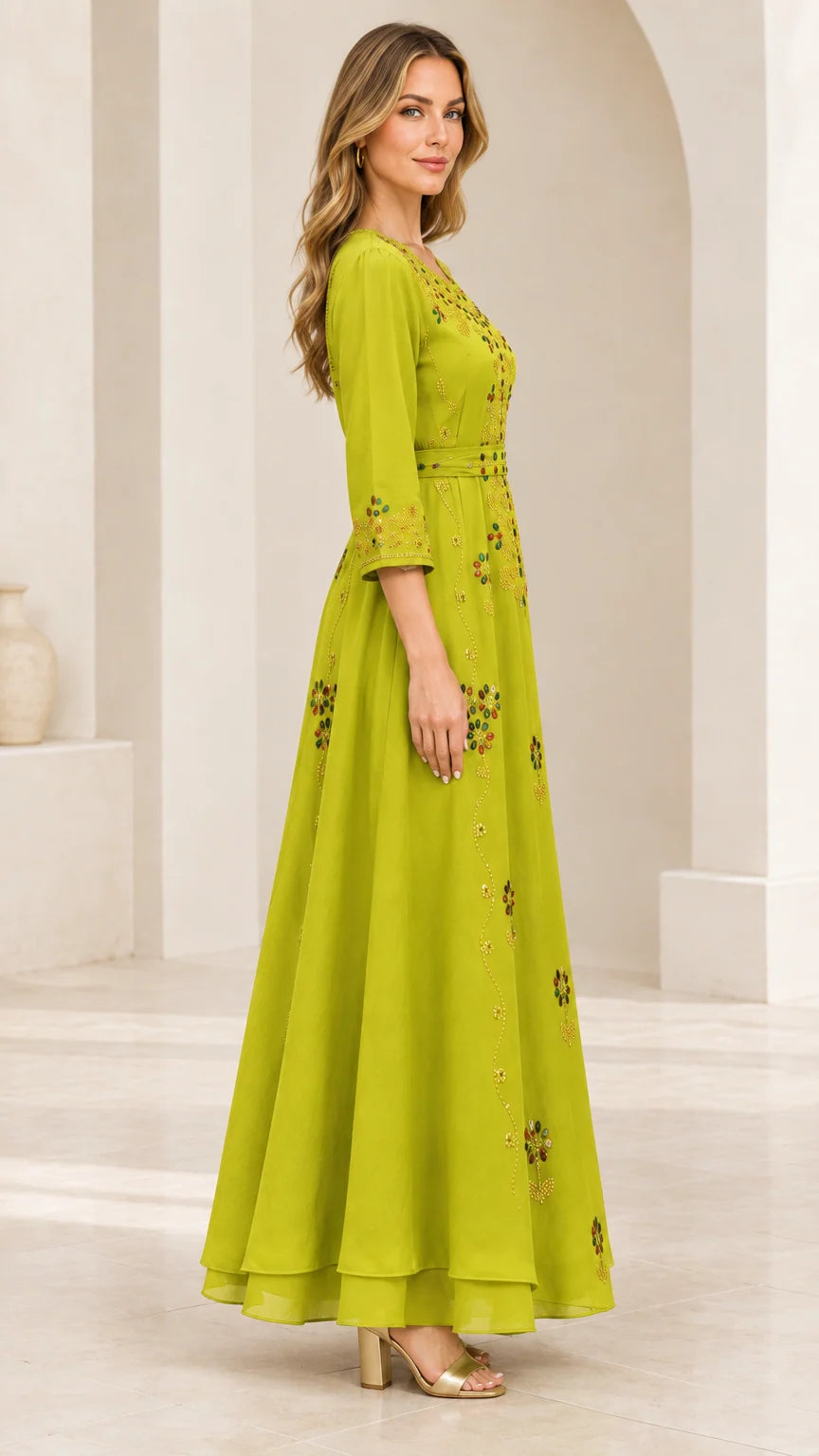 Side full-length view of woman in Lime Green 3/4 sleeve beaded evening gown