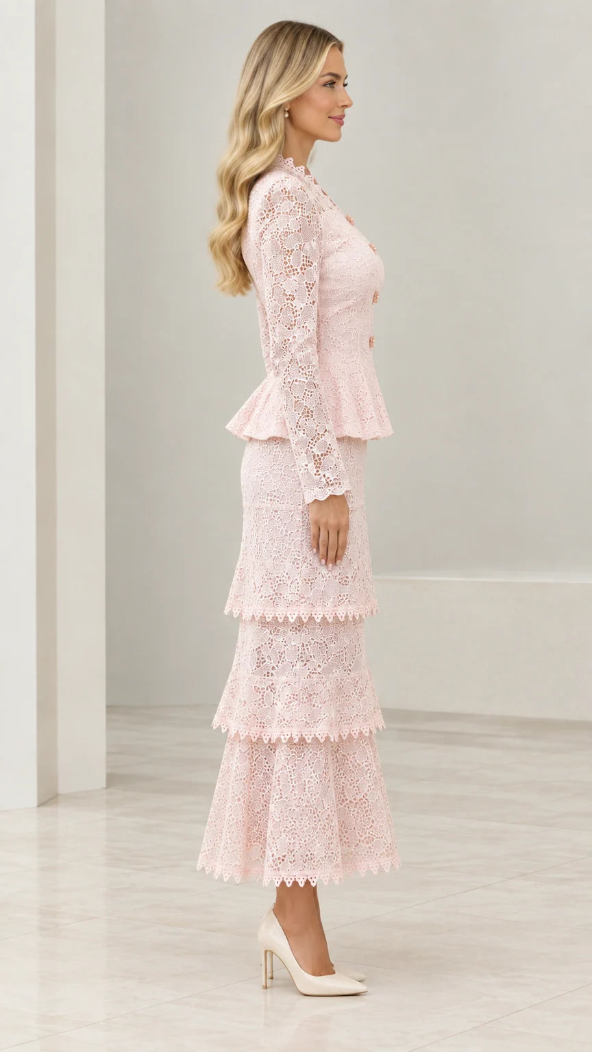 Side profile of model in Blush Pink floral lace formal skirt suit