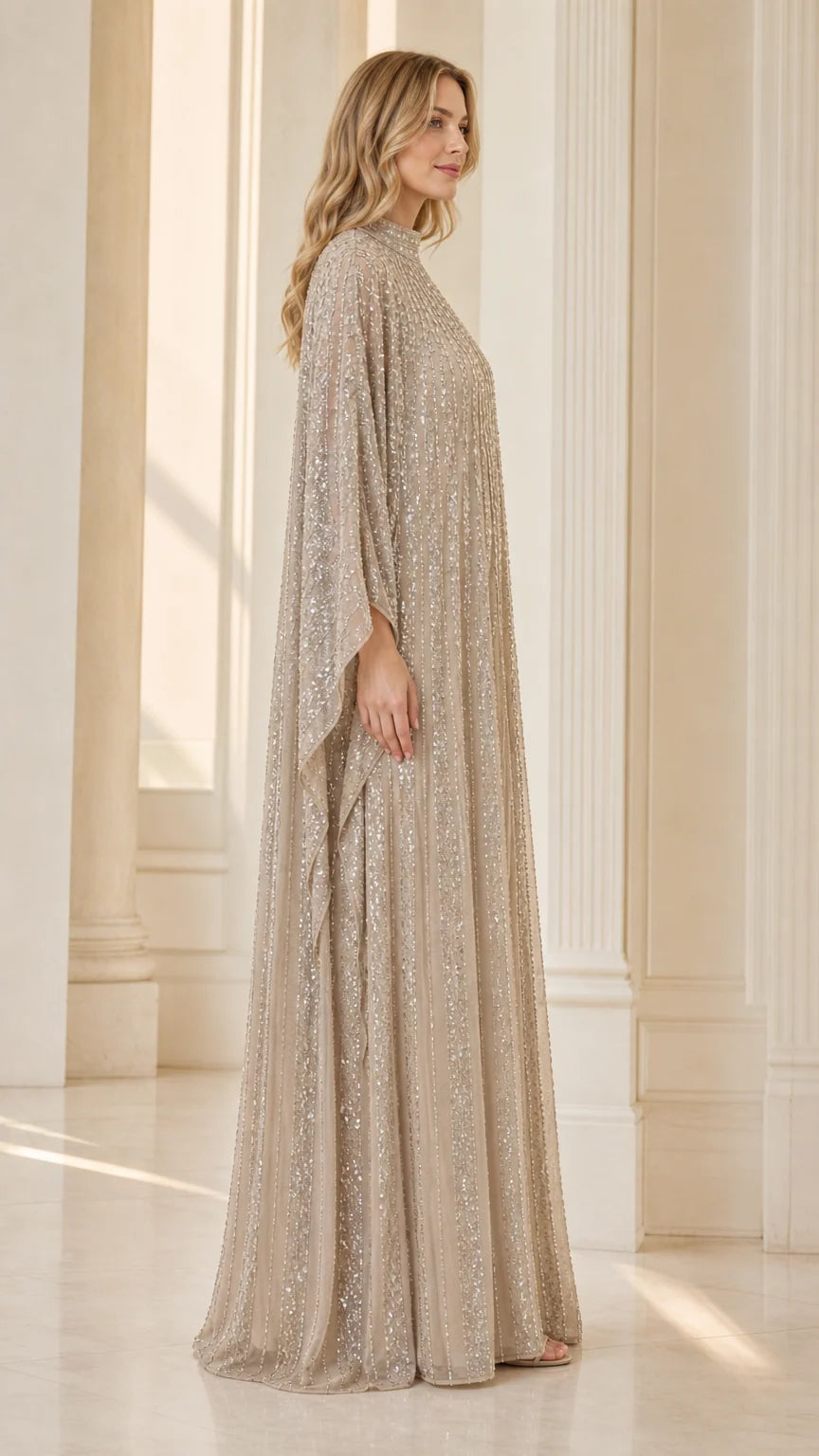 Champagne pleated sequin kaftan evening dress side profile with cape sleeves