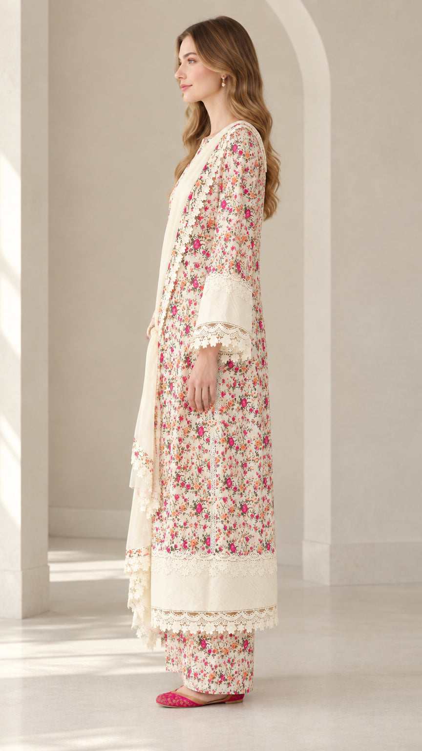 Side profile view of woman wearing Ivory floral print tunic and palazzo pant set