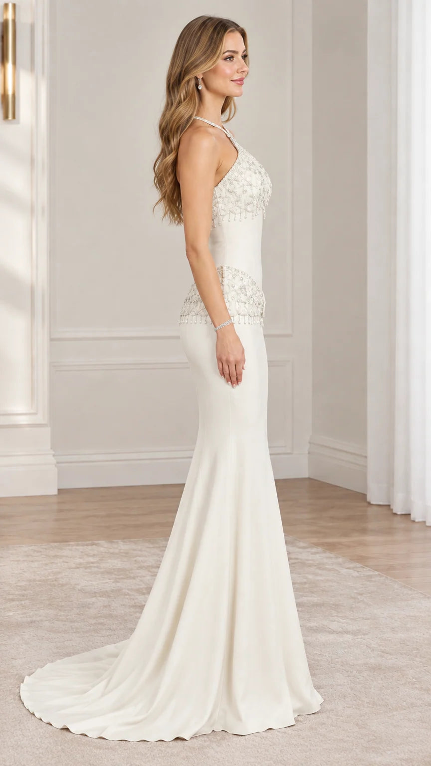 Side profile view of ivory beaded halter formal dress showing silhouette and train