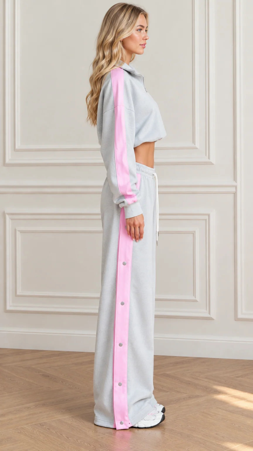 Side profile view of Heather Grey cropped sweatshirt and snap button pants set