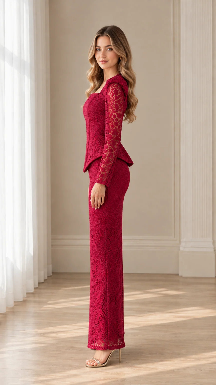 Side profile of model in burgundy long sleeve lace peplum top and matching column skirt