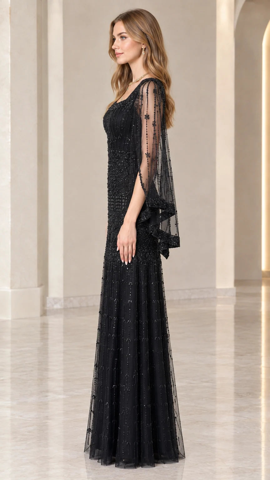 Side angle view of black sequin formal gown showing sleeve drape and column silhouette
