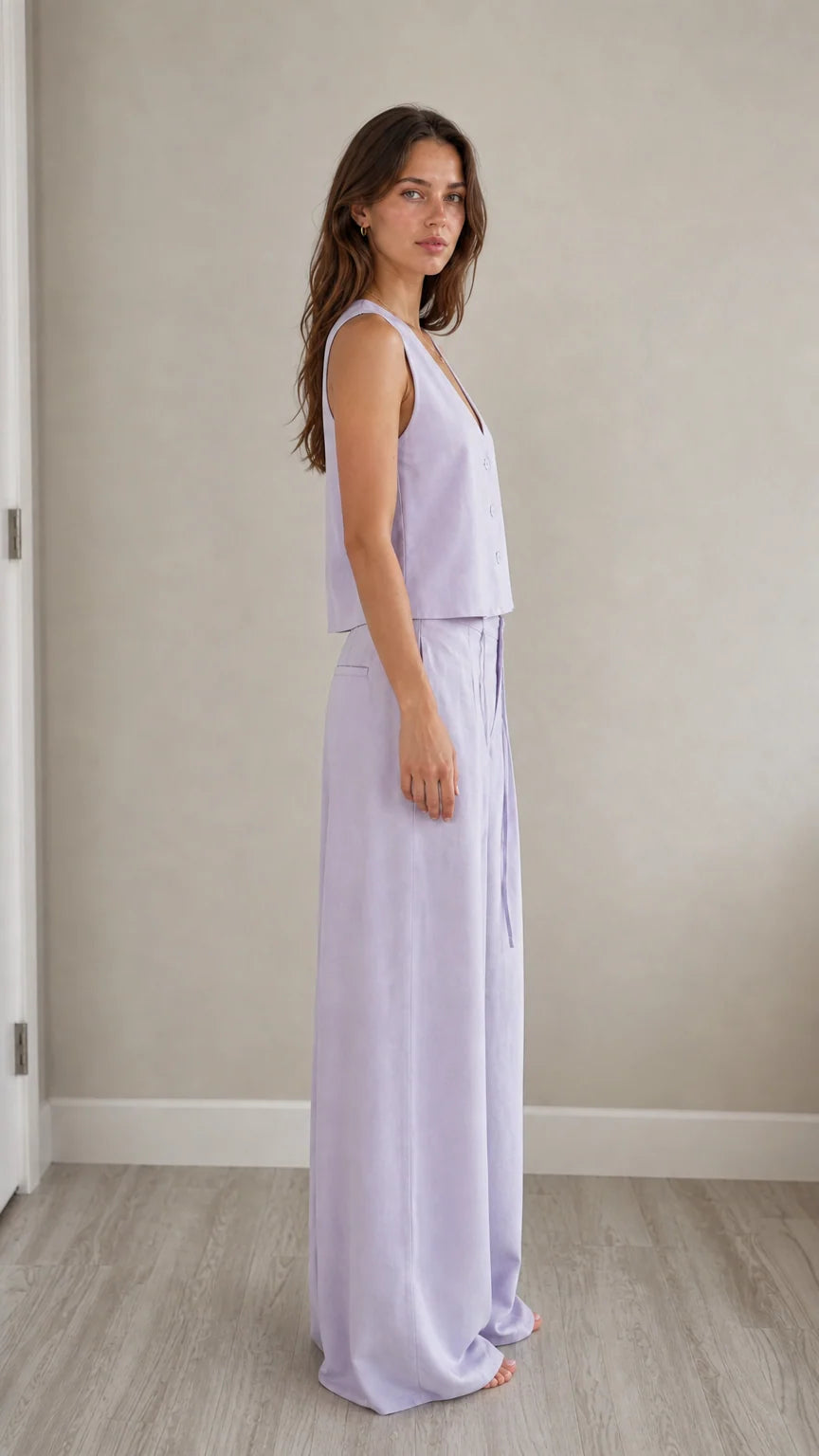 Side profile view of model in lavender two-piece set