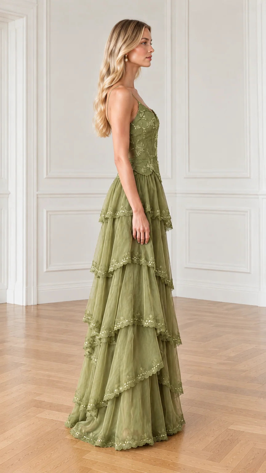 Side angle of olive green tiered ruffle evening gown