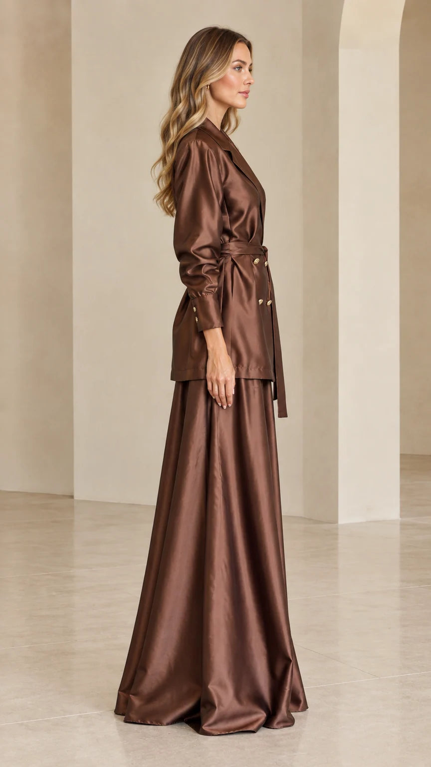 Side profile view of chocolate brown satin blazer and maxi skirt set