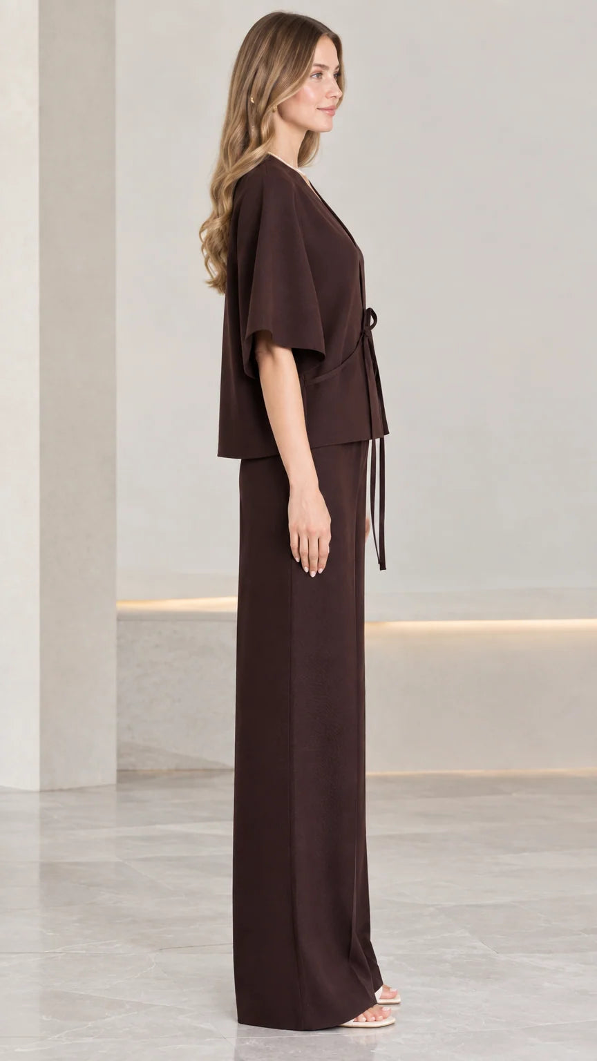 Side profile view of chocolate brown two-piece kimono top and wide-leg trousers set