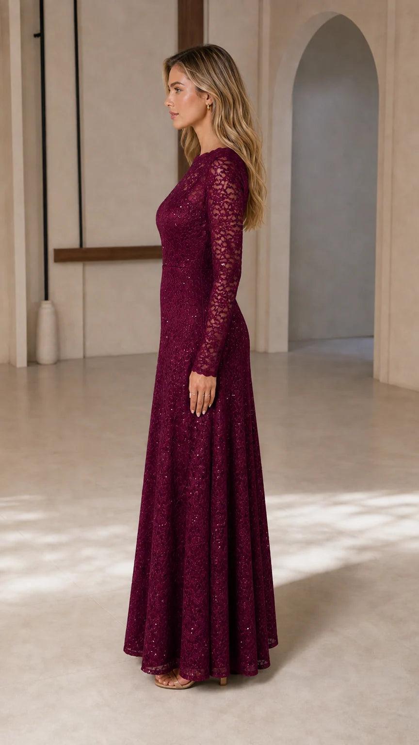 Side profile view of burgundy lace maxi dress