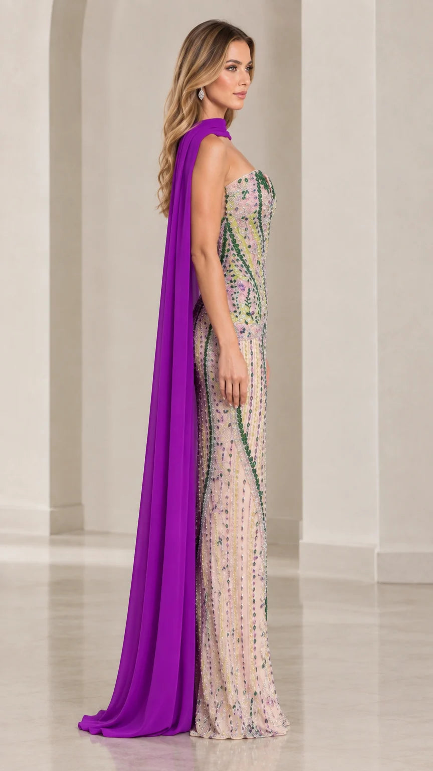 Side angle of model showcasing purple beaded column gown and back draped cape