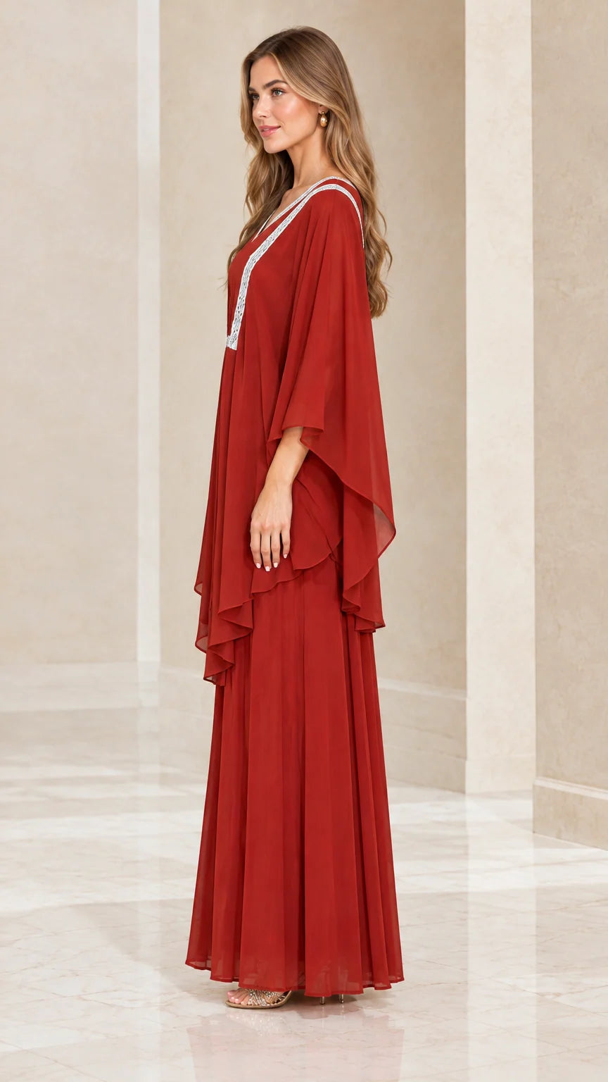Side profile view of rust red flowing chiffon layered kaftan maxi dress