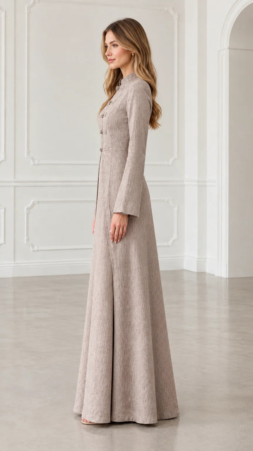 Side profile view of oatmeal long sleeve structured A-line maxi dress