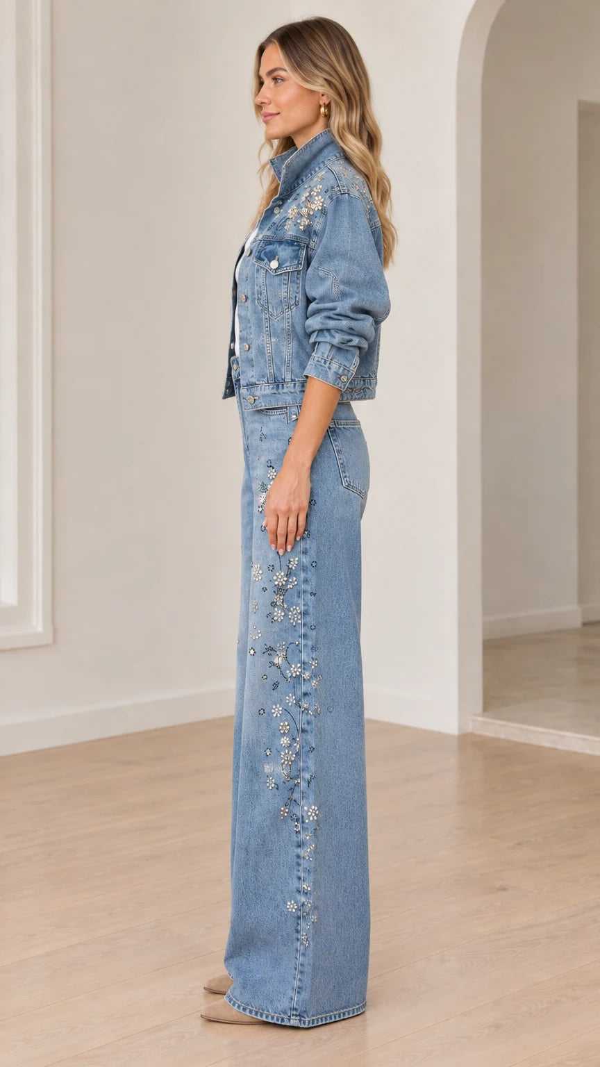 Side view of model in light blue beaded denim jacket and matching wide-leg trousers