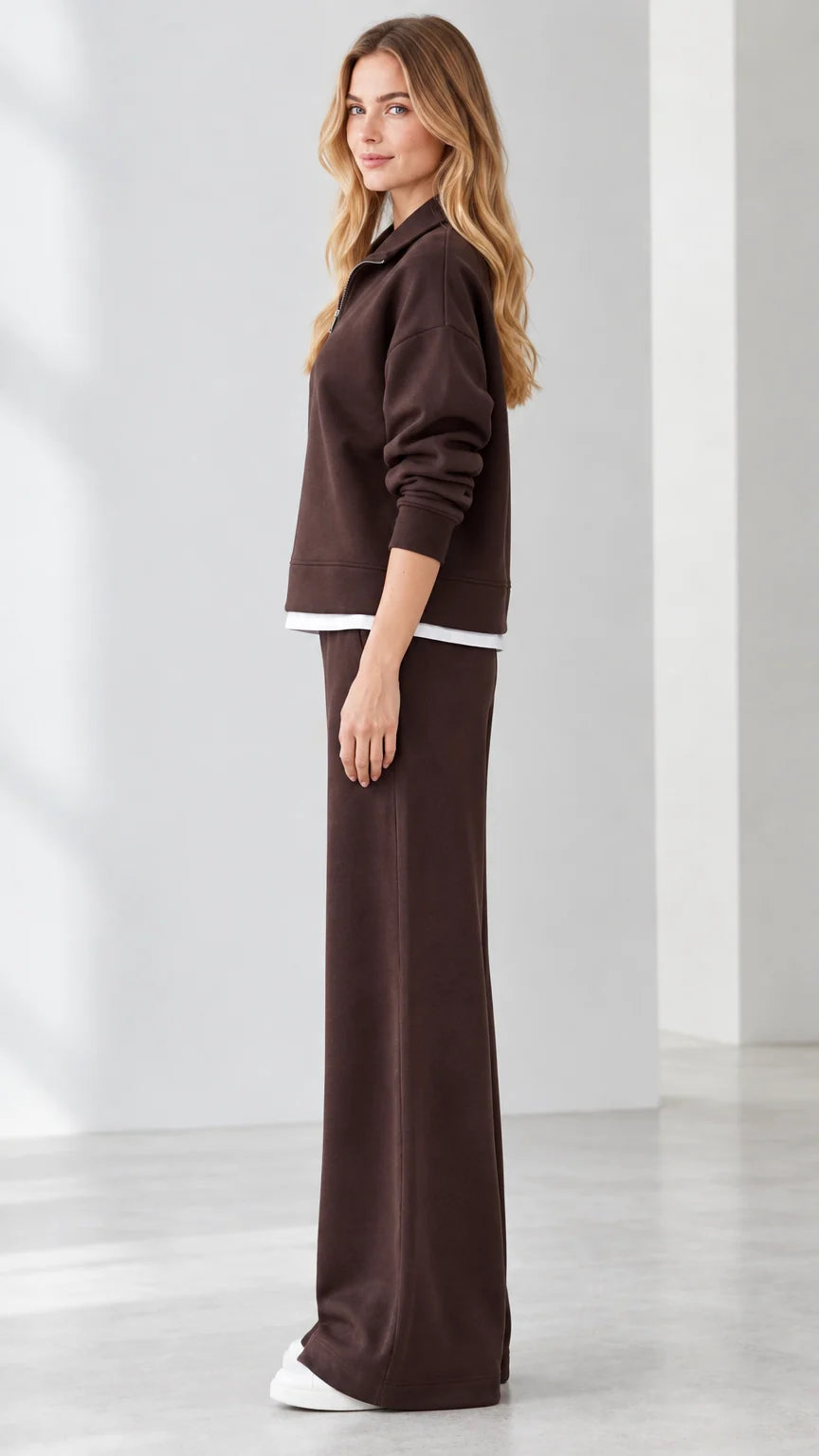 Side profile view of model in brown 2-piece wide-leg lounge tracksuit