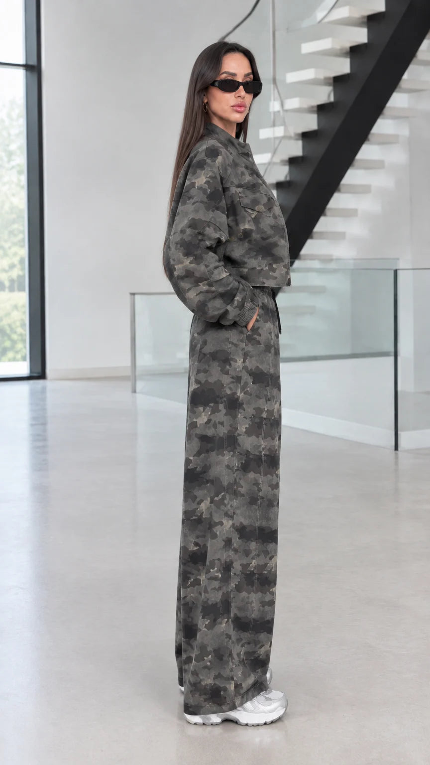 Side profile view of model wearing Green Camo two-piece set