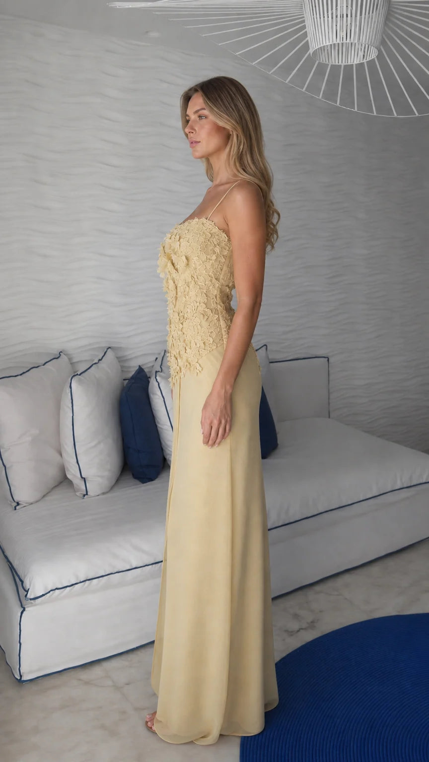 Side profile view of yellow maxi dress